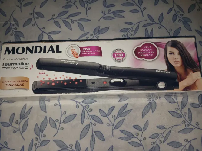 VENDO PRANCHA /CABELO MUNDIAL $50,00