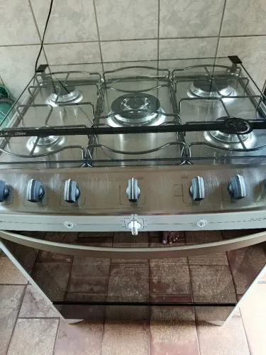 Vendo fogão GE de 5bcs com grill e timer.