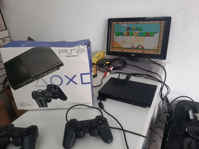 Playstation 2 na caixa funcionando conservado