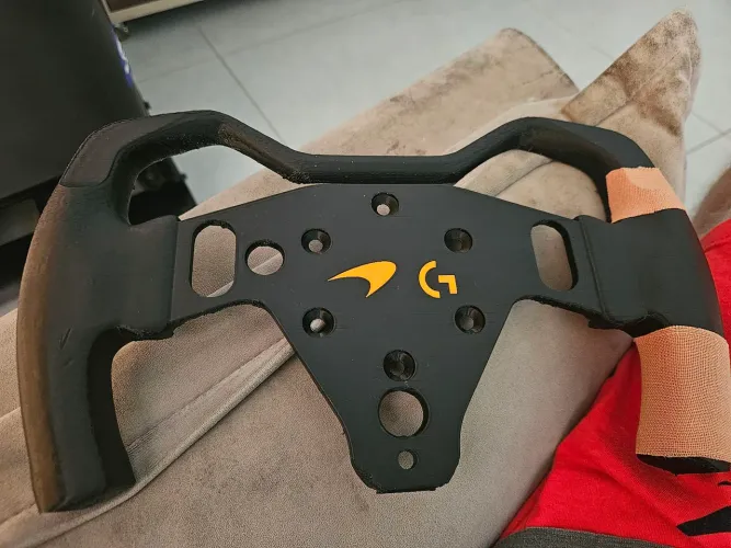 Vendo add on volante RS50 logitech impresso 3D so parafusar no lugar do outro.