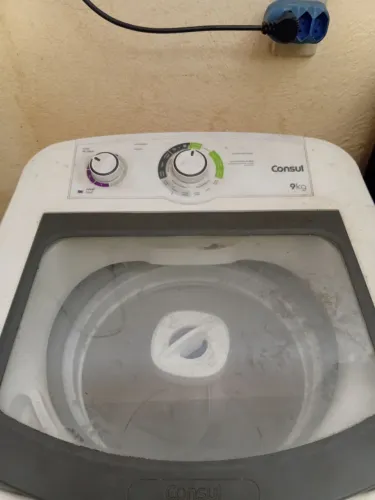 Máquina de lavar com pequeno defeito