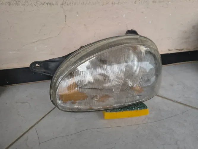 Farol esquerdo Corsa 94/00 original