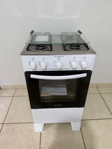 Fogão 4 bocas semi novo , entrego