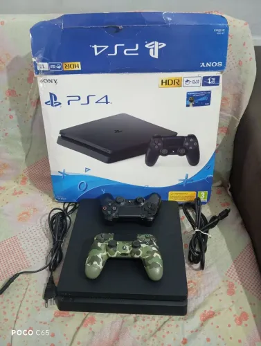 PlayStation 4 slim. Desbloqueado 1tb. 6 jogos. Dois controle original. Vai na caixa. cabo