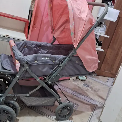 Carrinho rosa de bebê seminovo