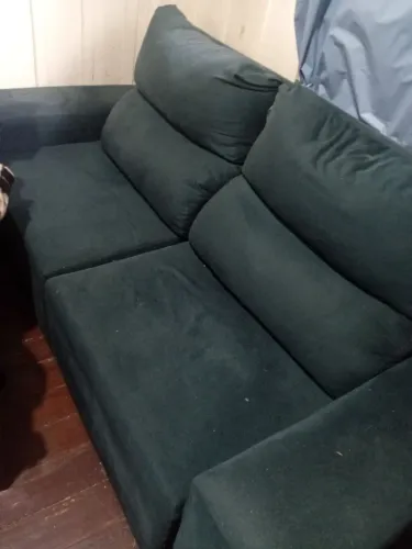 Sofá azul semi novo