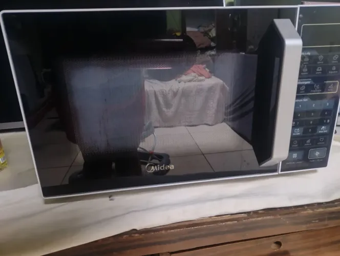 Vendo microondas 27 l semi-novo funcionando tudo