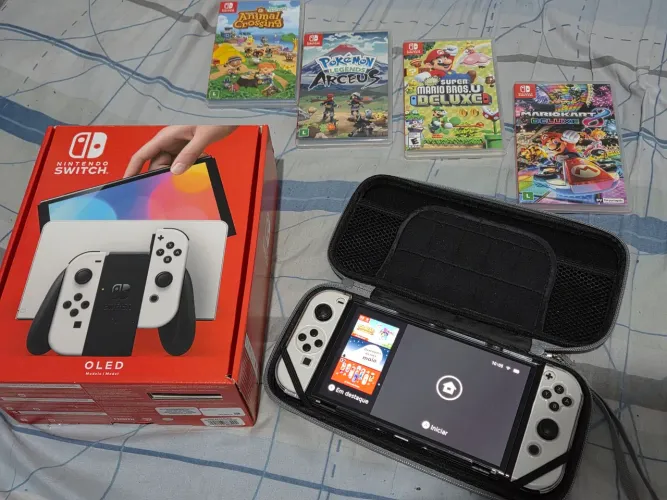 Nintendo Switch OLED + 4 jogos físicos