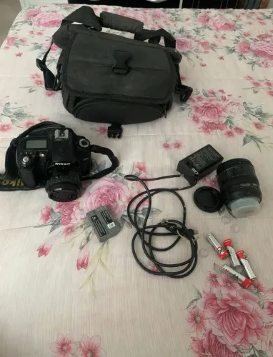 Nikon D90 + 2 baterias + carregador + caixa original ? excelente estado