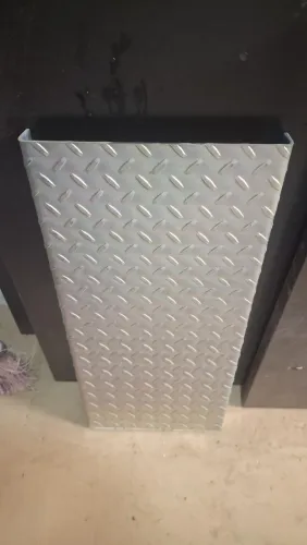 Pe de escada de metal