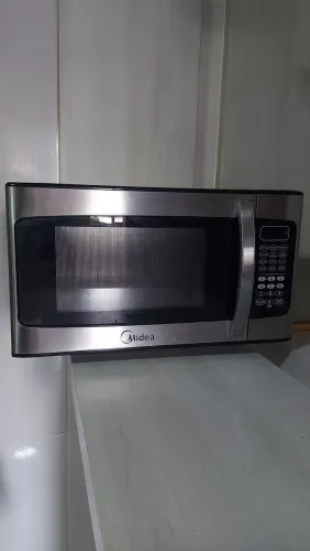 Micro-ondas Midea Inox Retirada de peça ou concerto.