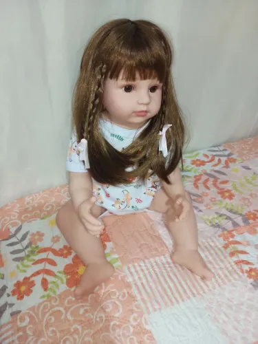 Boneca Reborn menina de trancinhas