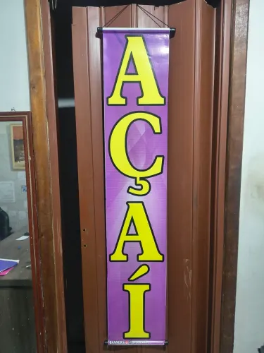 Banner AÇAÍ medindo: 1,25x0,25 com alça para prender. Retirada no Cachambi