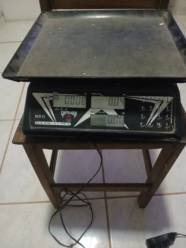 Uma Balança e uma bague.