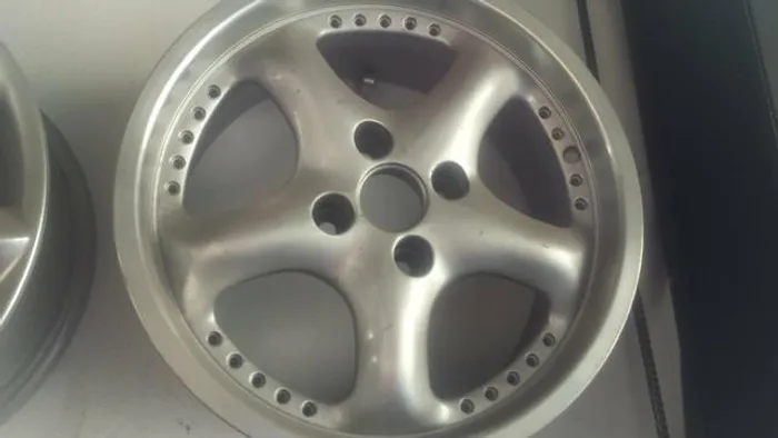Roda aro 15 Porsche Prata com borda diamantada Tala 7 VW gol 4X100 