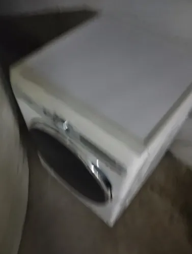 Máquina de lavar e secar