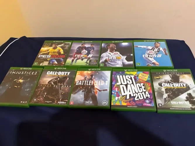 Qualquer jogo da foto por $80,00 Xbox one,