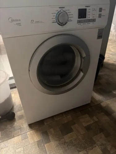Máquina de secar roupas