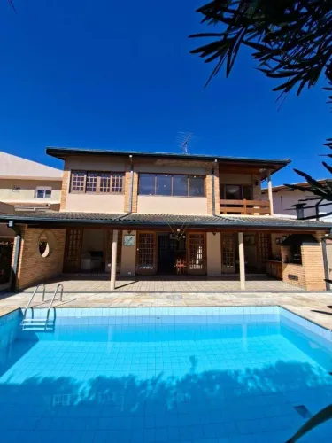 Casa com 4 dormitórios para alugar, 356 m² por R$ 18.021/mês - Residencial Cinco (Alphavil