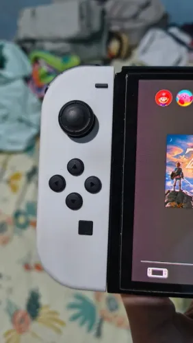 Nintendo switch oled + zelda mídia física e acessórios