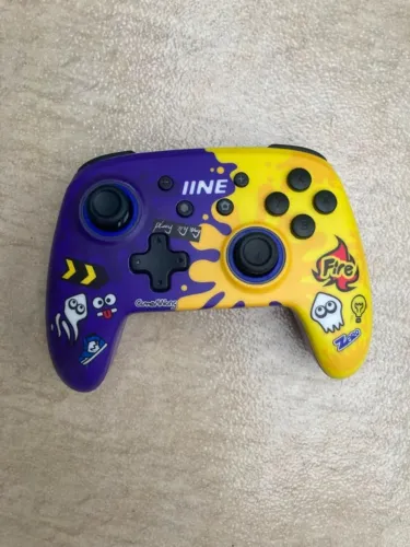 controle iine nintendo roxo e amarelo