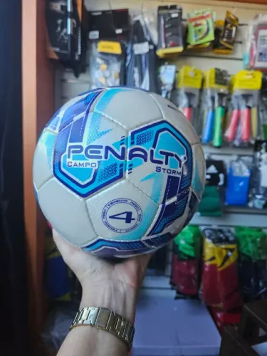 PROMOÇÃO BOLA  JUVENIL DE CAMPO PENALTY STORM COSTURADA NÚMERAÇAO 04 