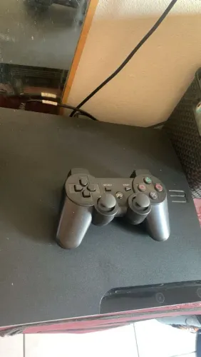Vendo ps3 slim com uma manete