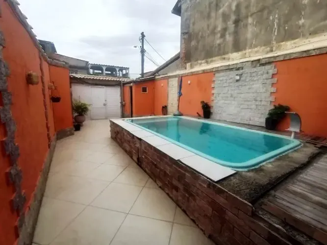 REALENGO CASA COM PISCINA 3 QUARTOS