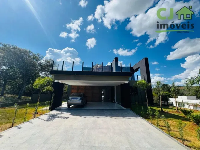 Casa com 4 dormitórios à venda, 417 m² por R$ 3.900.000,00 - Condomínio Vitória Golf - Lag