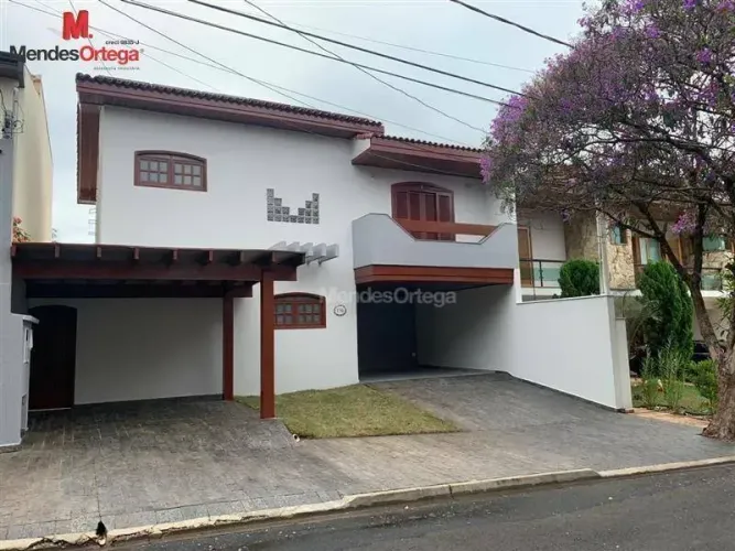 Casa com 3 dormitórios para alugar, 270 m² por R$ 7.417,00/mês - Condomínio Granja Olga I