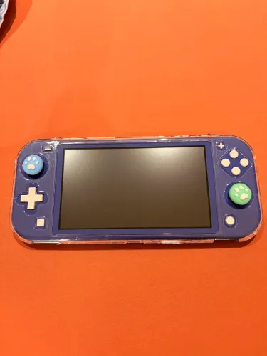 Nintendo Switch Lite Azul com acessórios