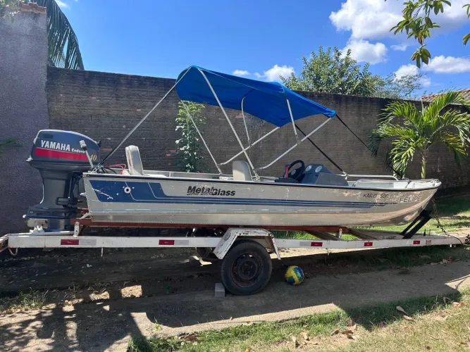 Vendo barco com motor semi novo