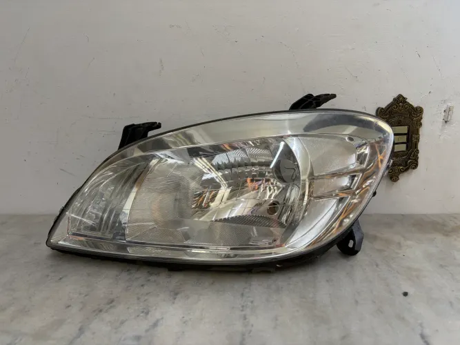 Farol celta original 2006/2012 lado esquerdo 
