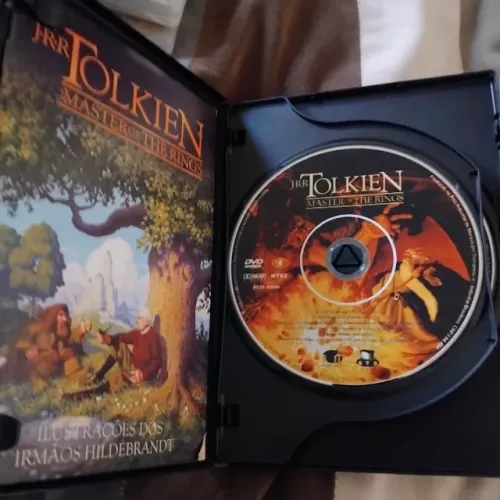 Raro! Dvd e cd da Trilha e livreto JJR Tolkien Guia de entendimento do Senhor dos Aneis
