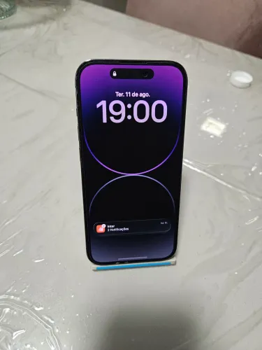 Vendo iphone 14 pro, na cor roxo, 128 gb,com saúde da bateria de 77%