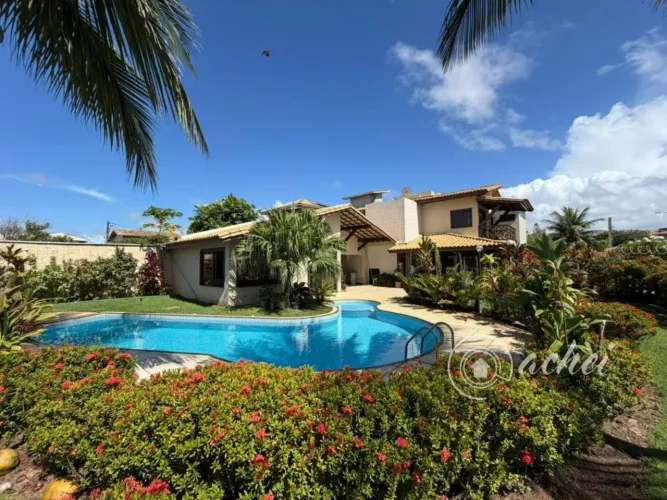 Casa ampla com 4 suítes, piscina e 700 m² de terreno em Vilas do Atlântico