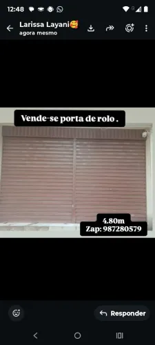 Vende-se porta de rolo, largura 4.80mt/5mt, aceito troca de material de construção.