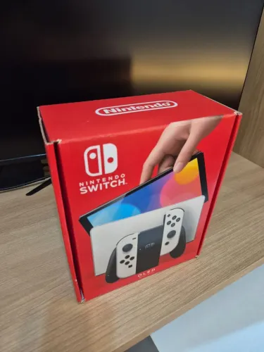 Nintendo Switch Oled 64 GB + micro SD 128 GB