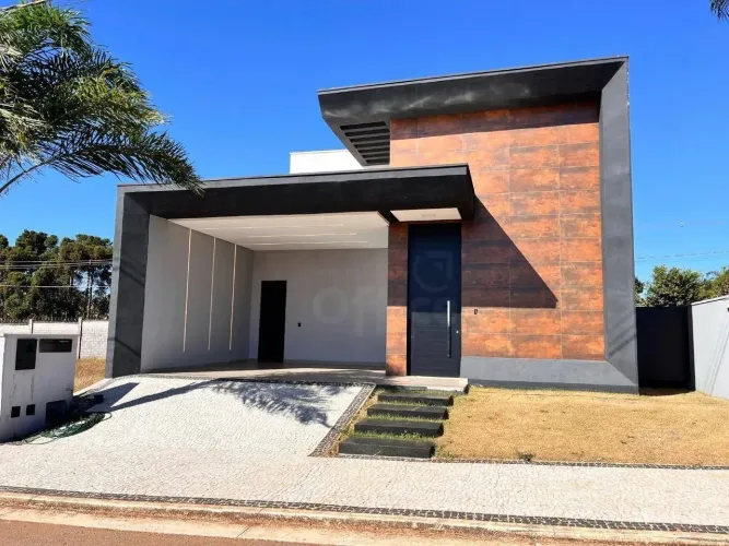 Casa com 3 dormitórios para alugar, 213 m² por R$ 6.955,40/mês - Condomínio Residencial Ga