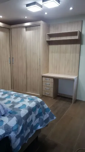 Guarda roupa planejado casal interior de gramado