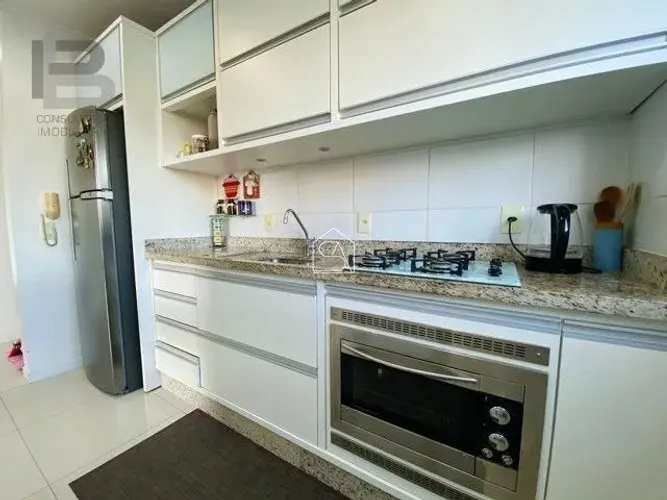 Apartamento a venda Pagani dois dormitórios sendo uma suite.