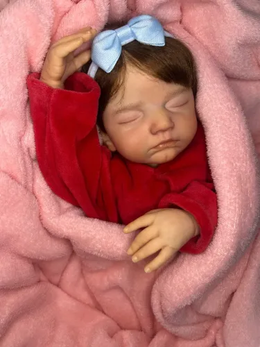 Bebê reborn kit Sarah com enxoval