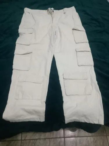 Calça sarja bege 46 más veste 48