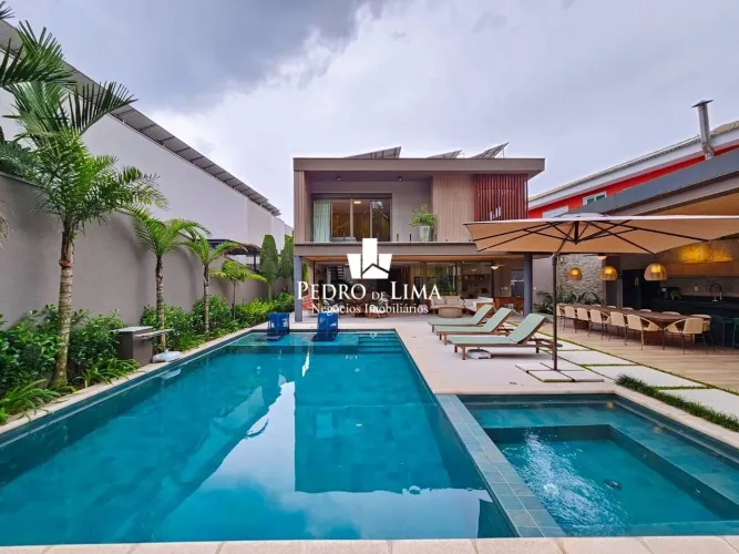 Casa com 5 dormitórios à venda, 420 m² por R$ 9.600.000,00 - Riviera Módulo 19 - Bertioga/