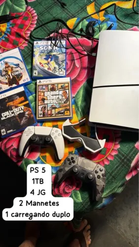 PlayStation 5 novo . 1 tb. 4 jogos,2 manetes,1 carregador duplo