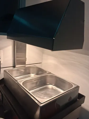 Aquecedora de alimentos condimentadora