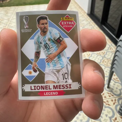 Figurinha extra Panini Messi dourado Copa de 2022