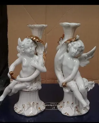 Castiçais de porcelana peças importadas da Itália 