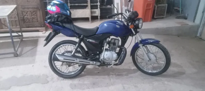 Fam 125 original  venda ou troco por carro pequeno em dia até $8500