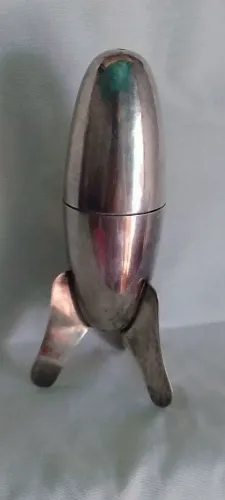 Paliteiro em forma de foguete banho de prata 14 cm